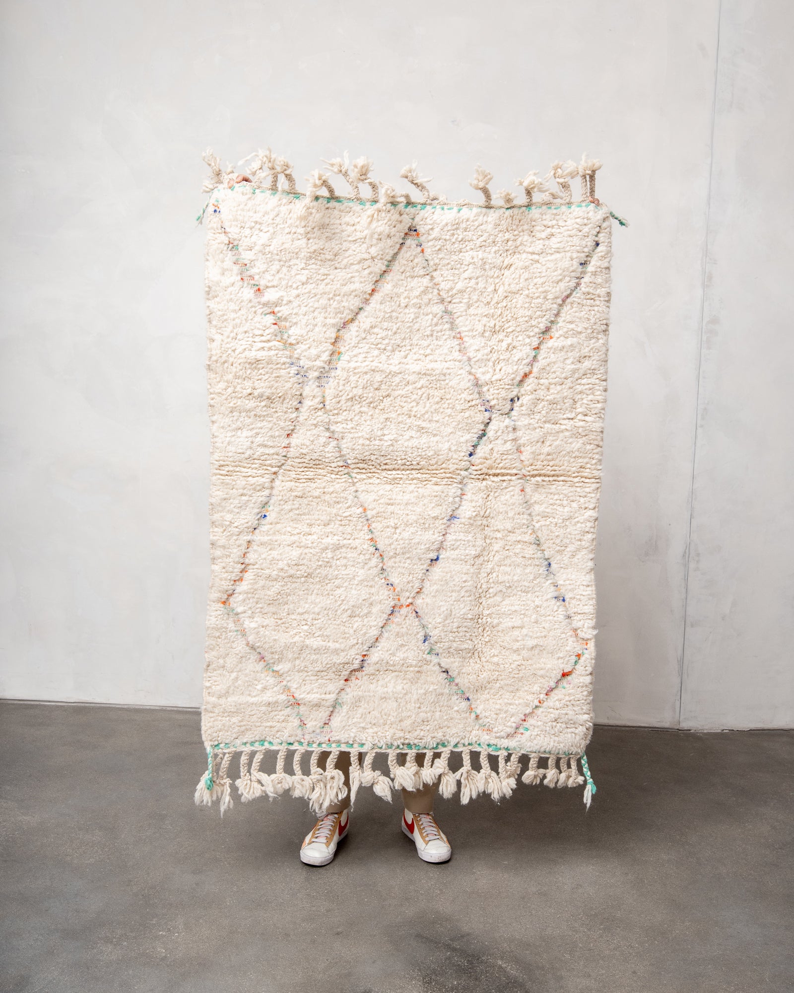 Modern, designer, handcrafted Berber rug from Morocco. Beniourain carpet with beautiful colours and patterns and fluffy wool texture.